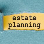 Estate,Planning,Written,On,Yellow,Paper,With,Torn,Edges