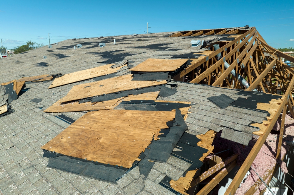 Ruined,Rooftop,In,Need,Of,Repair.,Wind,Damaged,House,Roof