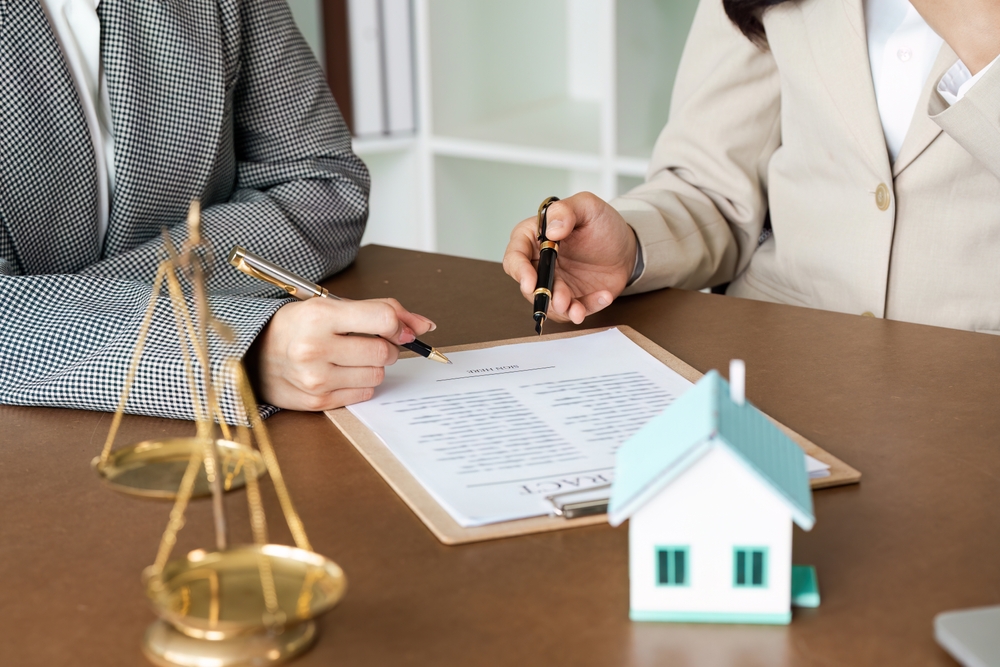 Professional,Legal,Consultation,With,Lawyers,Reviewing,Contract,Documents,And,Scales